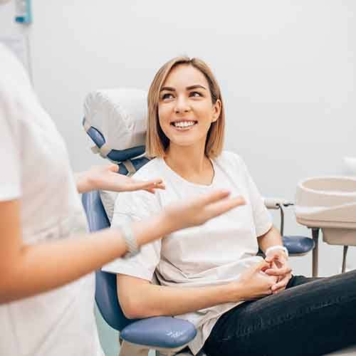 Patient talking to a dentist